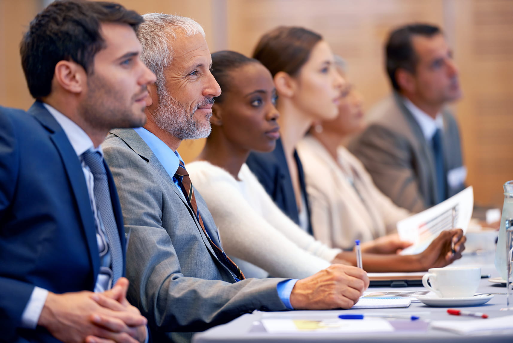 Group of legal professionals attending a workplace dispute resolution and employment mediation discussion.